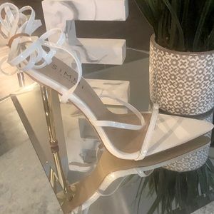 Simmi White strappy snake heels